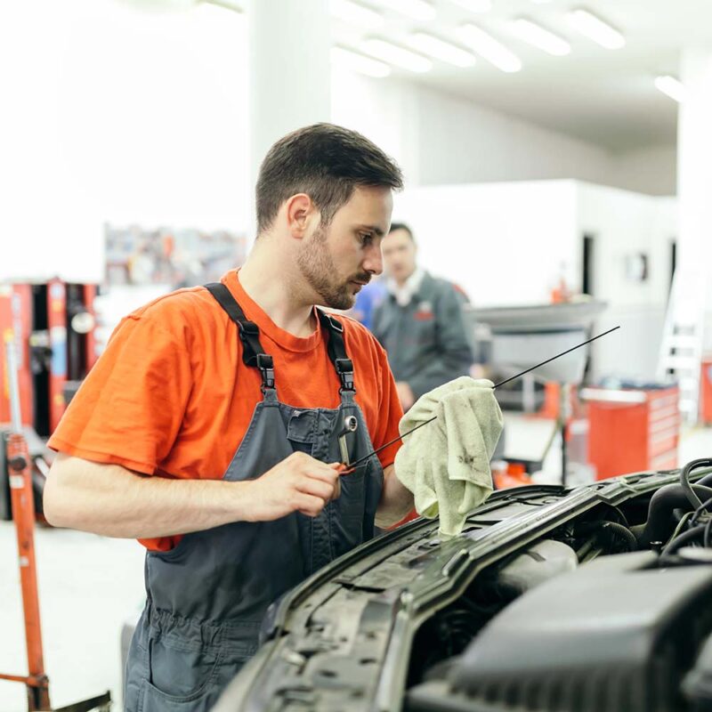 car mechanic fixing a car 637BVRZ min