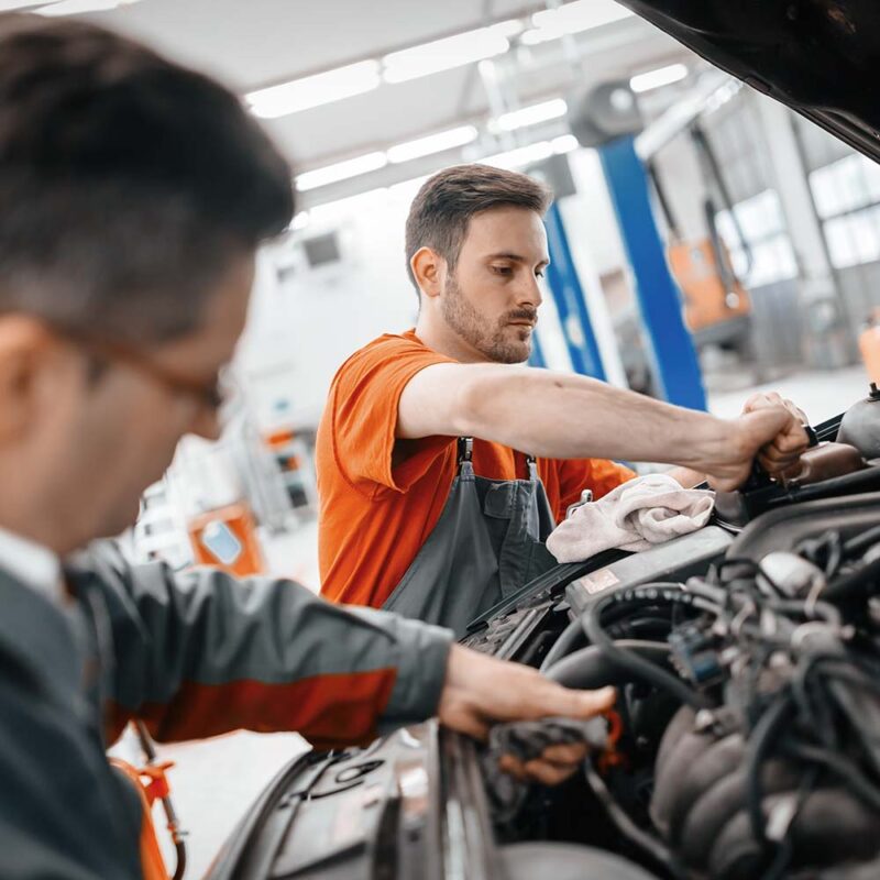 car mechanic working at service center 9KN5VXS